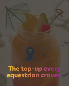 Mason jar with a drink, pineapple wedge, cherry, and umbrella on a blurred background with text.